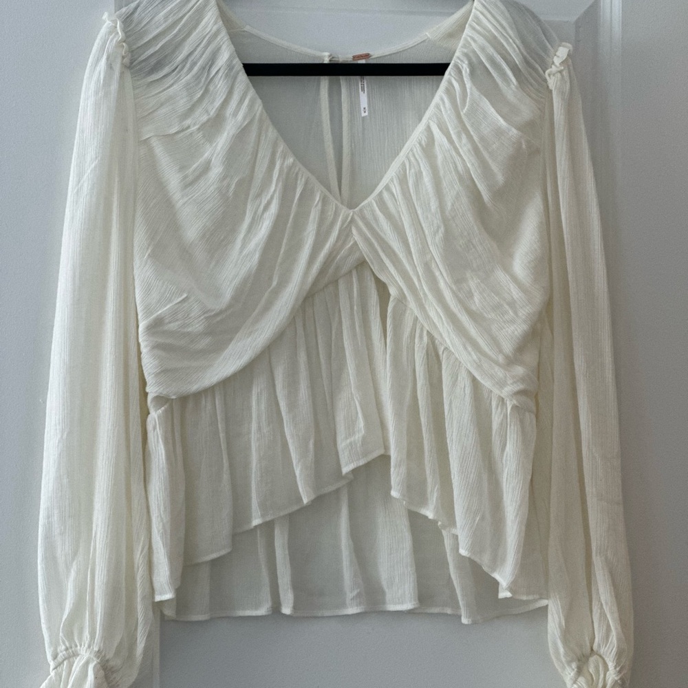 Free People White Puff Sleeve Blouse with Ruffled Hem and Long Sleeves